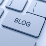 Blog sign button on keyboard with soft focus